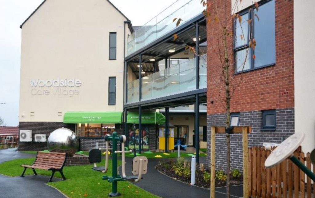 outside of the woodside cafe village